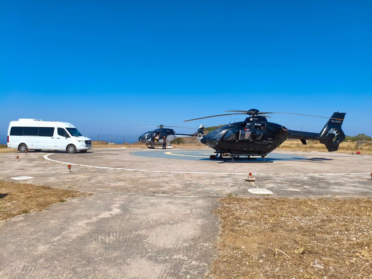 Private helipad executive reception and Mercedes vehicle in Sifnos