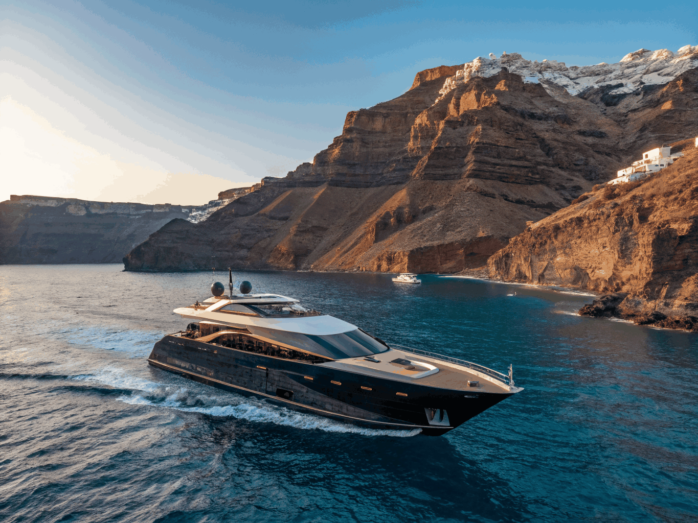Luxury yacht anchored at Mediterranean cove in Sifnos