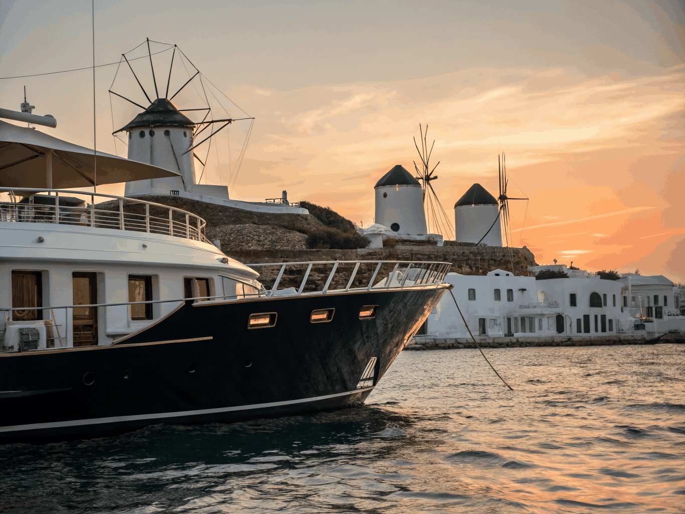 Marina tender and luxury chauffeur meeting at the pier in Sifnos